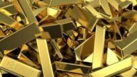 Gold price edges lower